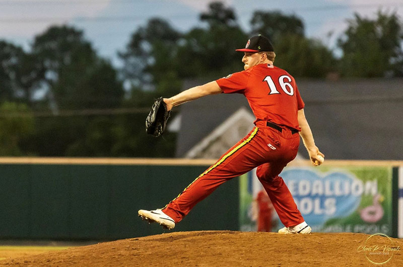 Brett Allen throwing pitch on mound