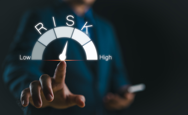 Businessman touching risk level indicator virtual rating low to high 