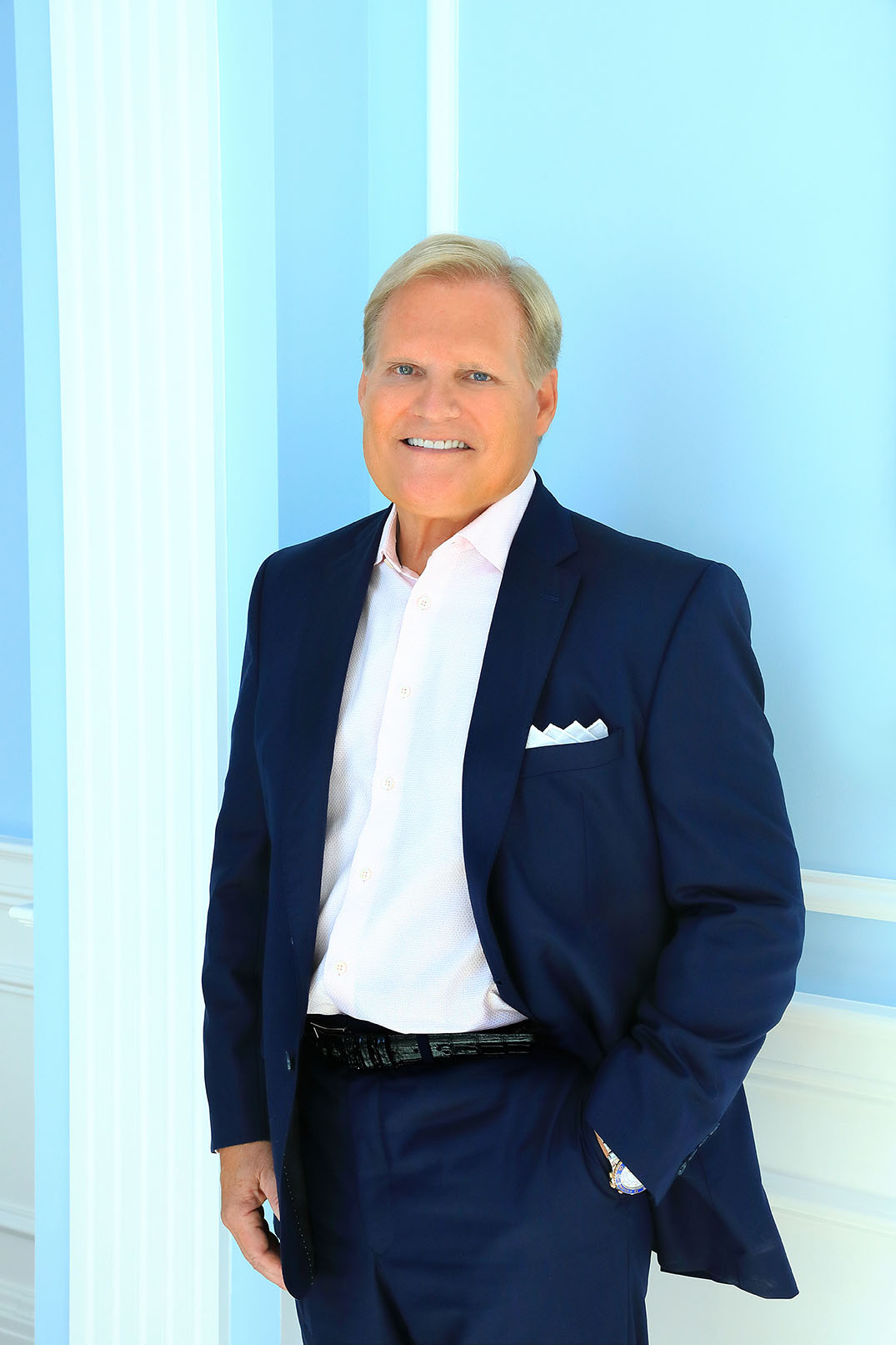 Doug Witcher smiling standing