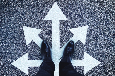image of feet on a path with many arrows