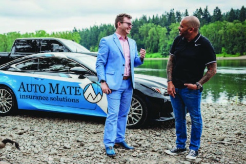 Steph Santi in a blue suit with a blue car
