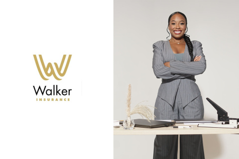 Walker Logo and Surrell behind desk