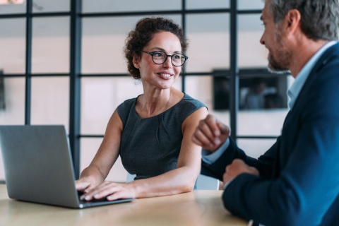 Insurance leaders discuss the future of insurance in a strategic meeting, analyzing evolving customer expectations and industry trends. 