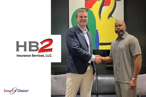 Hundley Batts Jr., president and CEO of HB2 Insurance Services, shakes hands with a client, exemplifying his commitment to building strong relationships in the insurance industry and highlighting his expertise in commercial and entertainment insurance.