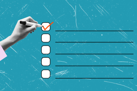 checklist with hand ticking first one off