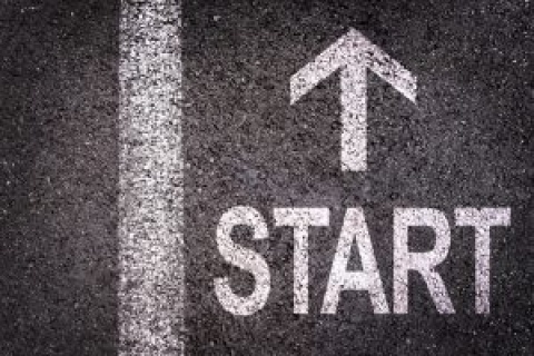 Start-arrow-in-chalk-on-pavement