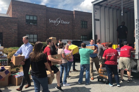 Smart Choice® employees loading trucks with foods to donate to United Way of Greater High Point