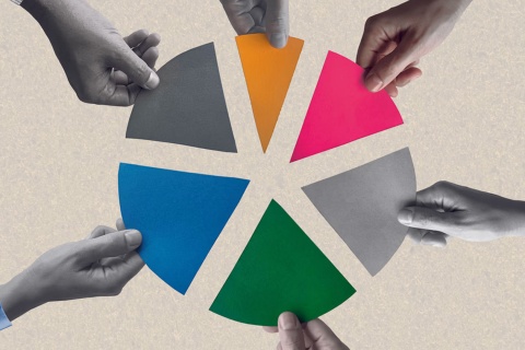 A colorful paper pie divided into slices, with a hand reaching for each piece, symbolizing the growth opportunities for independent insurance agencies to diversify into commercial lines for increased revenue.