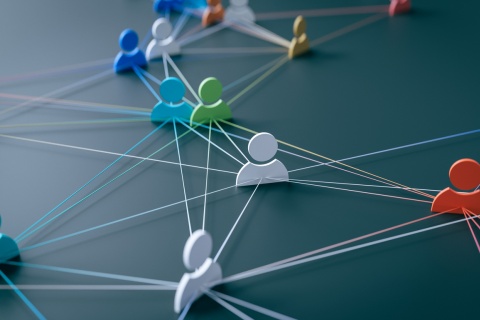 3D rendering of a hyper-connected society concept, featuring people icons connected by glowing lines, symbolizing communication, teamwork, and the independent agency system. The visual highlights the role of insurance agencies and independent insurance agents in fostering collaboration within a modern, networked world.