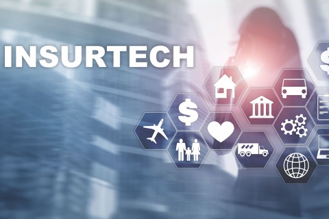 Graphic of hexagon-shaped icons like dollar signs, an airplane, a heart, gears, a car, and a laptop, with a blurry building in the background and the word "insurtech" in the foreground.