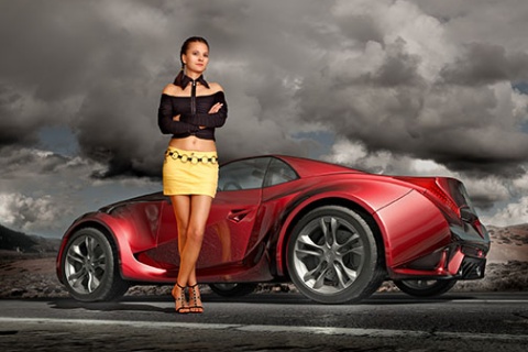 exotic car with woman standing in front