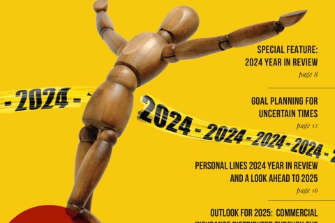 wooden figure breaking through 2024 tape